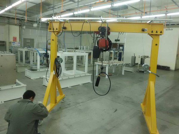 宁夏吴忠150吨包厢龙门吊厂家 未来起重机发展行